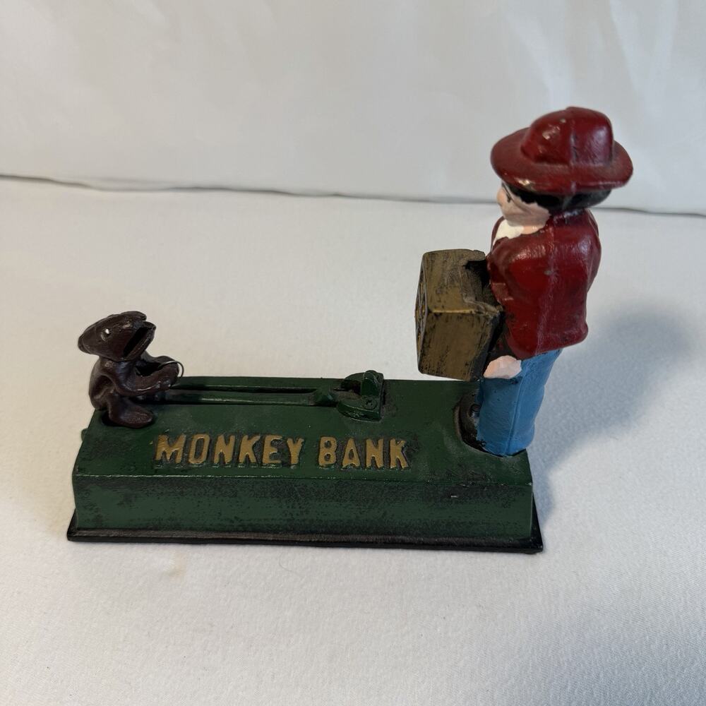 VTG Mechanical Cast Iron Jumping Monkey Coin Bank Works and in Good Condition!!